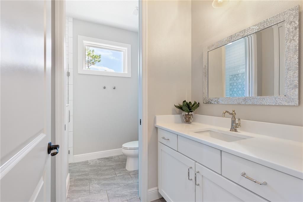 Shared Full Bathroom w/walk-in shower & enormous linen closet