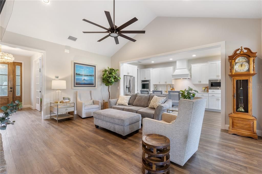 Plenty of natural light from the twin French doors, overlooking the covered back porch.