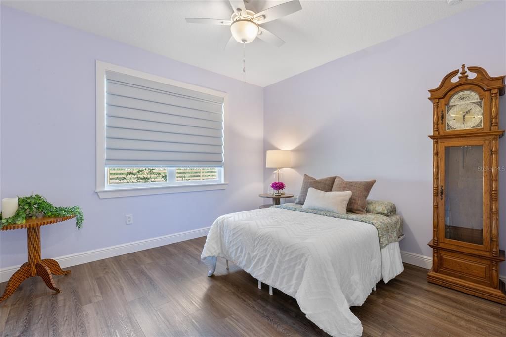 Bedroom 3 overlooking backyard.  Home to another Walk-in Closet.