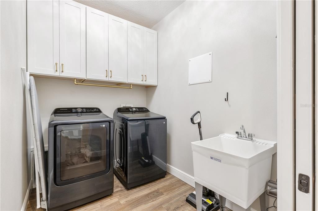 Laundry Room  w/laundry tub & 2024 W/D stays with home.