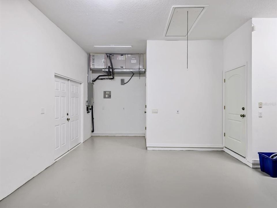 Double door access to garage for golf cart, bicycles