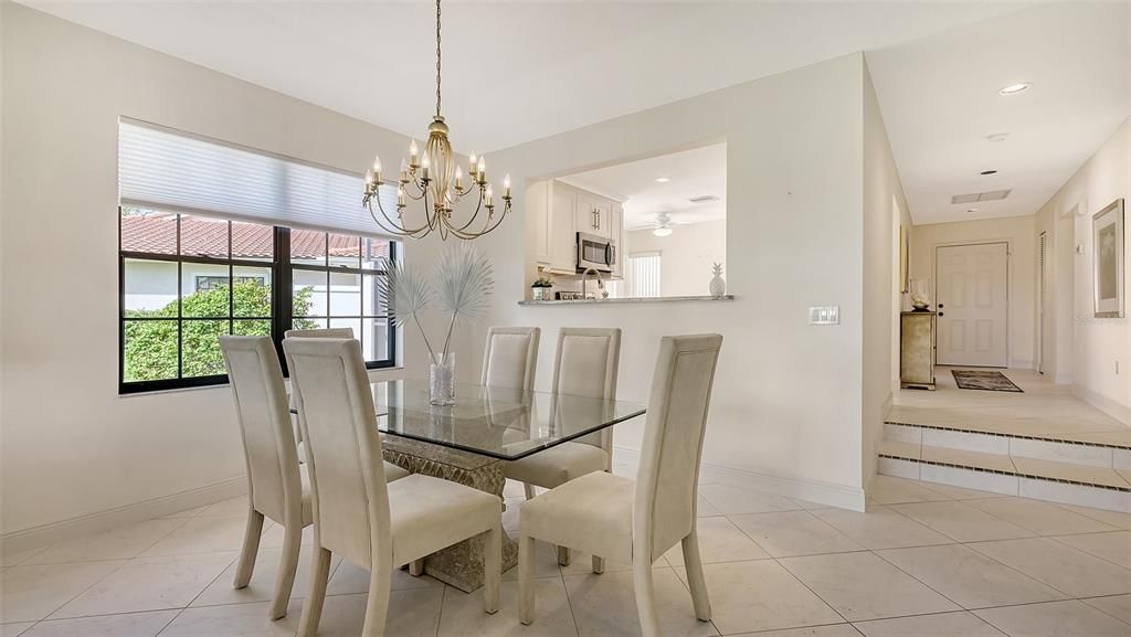 Adjacent dining room is perfect for both formal and casual gatherings