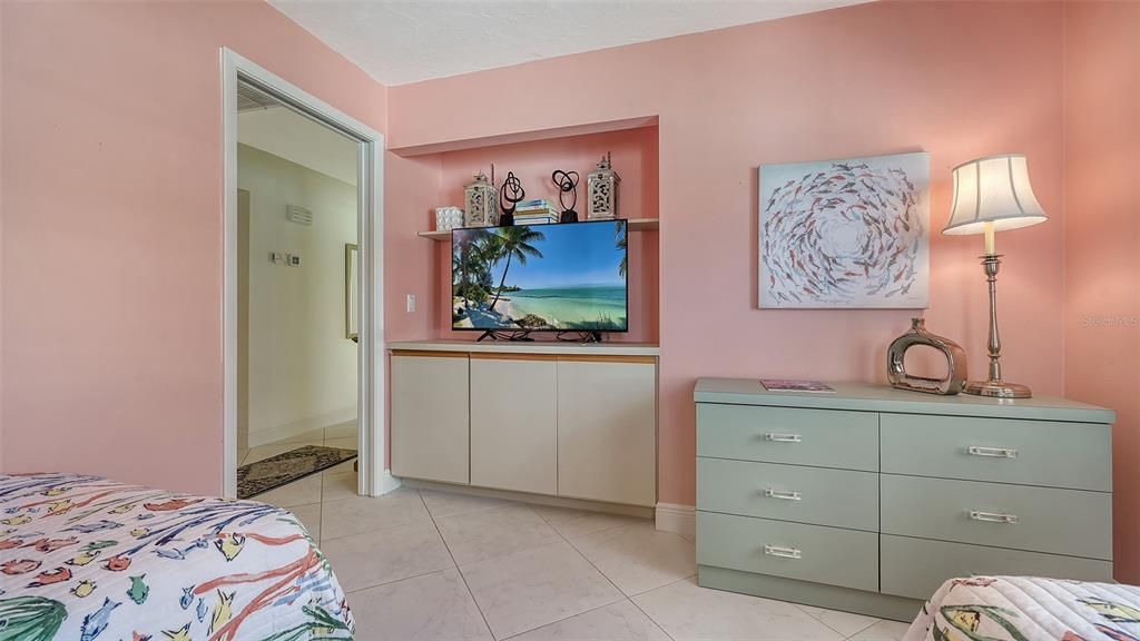 Built-in cabinet in alcove, easily convertible to a closet