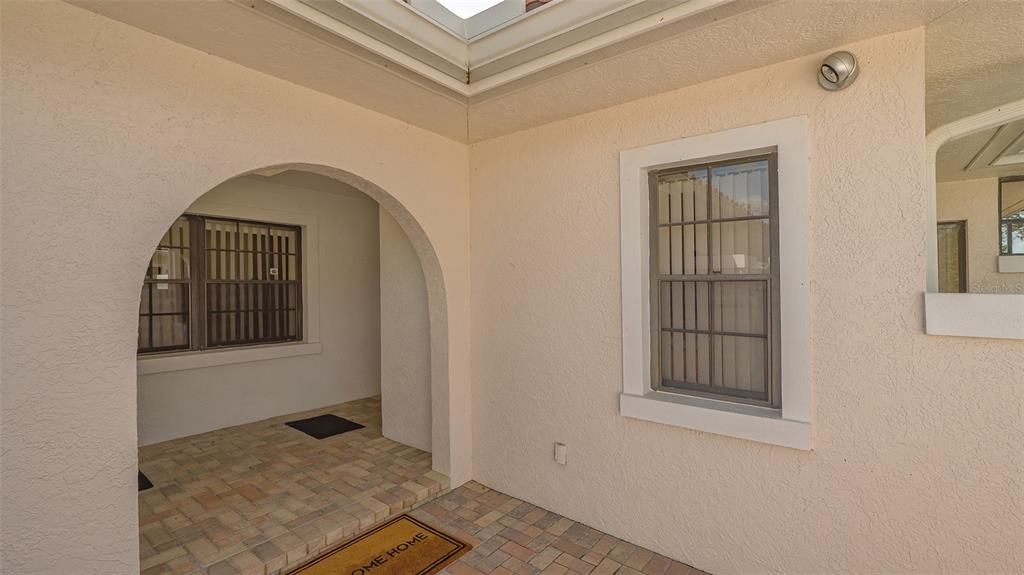 Covered entry provides convenient access from the garage