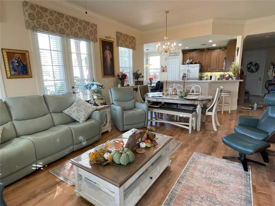 Floor-to-ceiling windows and new plank flooring