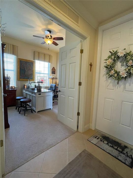 First bedroom with solid French doors for privacy