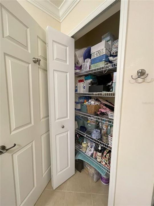 Extra storage in primary bath linen closet