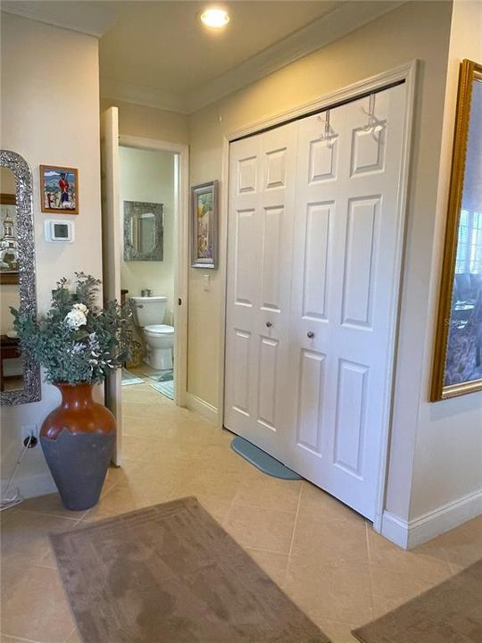 Laundry closet near front bedrooms