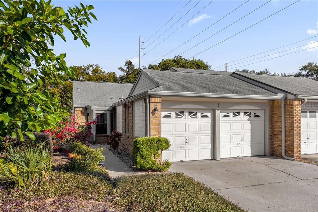 Front with 2 car garage