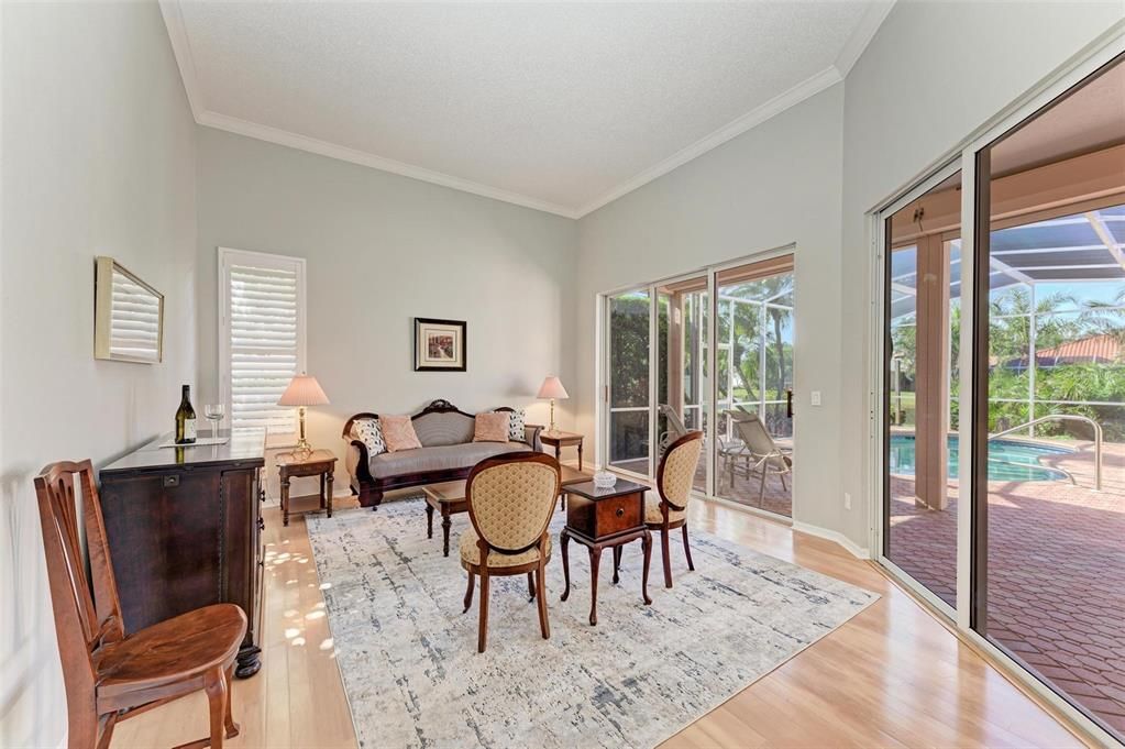 Spacious Living Room with sliders to the pool