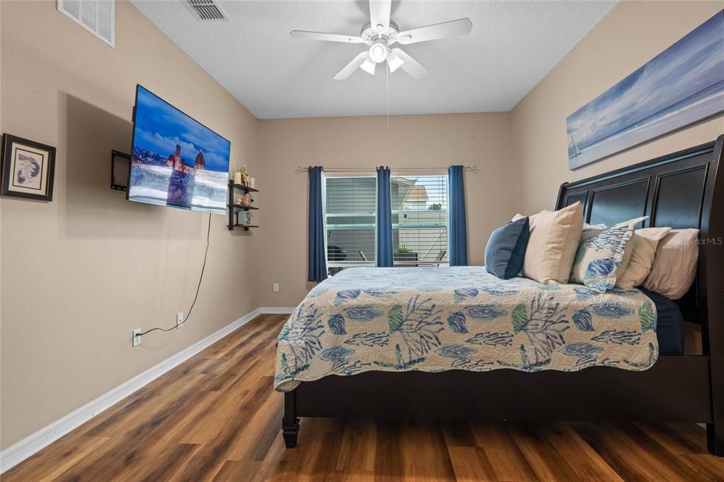 Ample natural light in primary bedroom