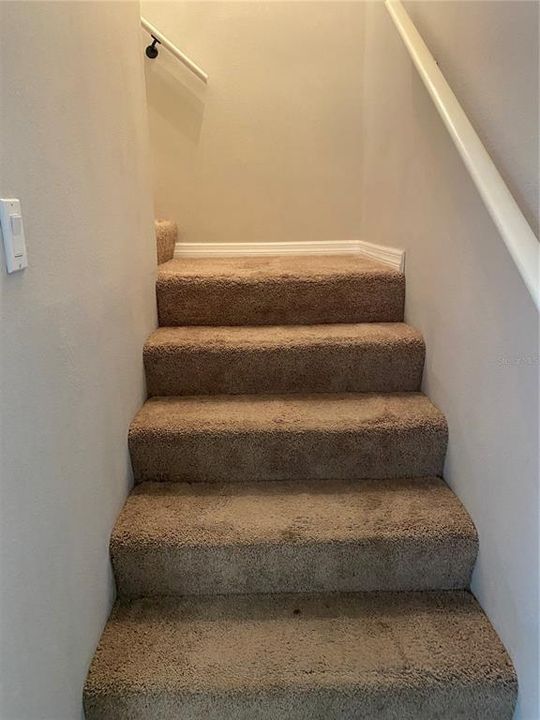 L shaped staircase to bedroom and bonus room/loft