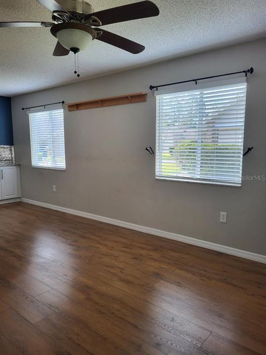 West facing windows in Living/ Dining area offer plenty of natural light