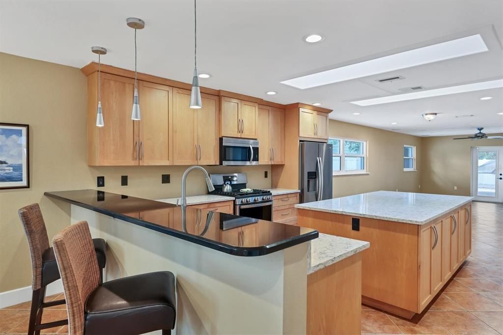 Open kitchen with granite counter tops