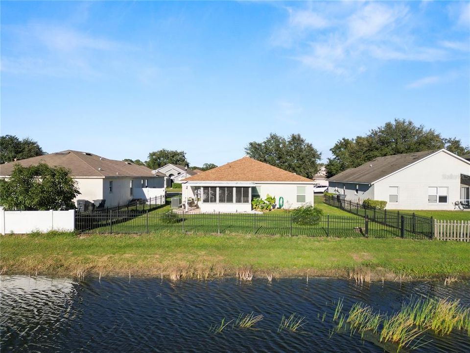 Home backs up to neighborhood pond.