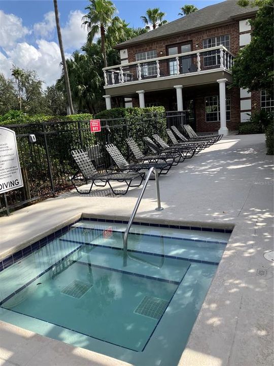 Spa area outside of gym and clubroom- one of several pools