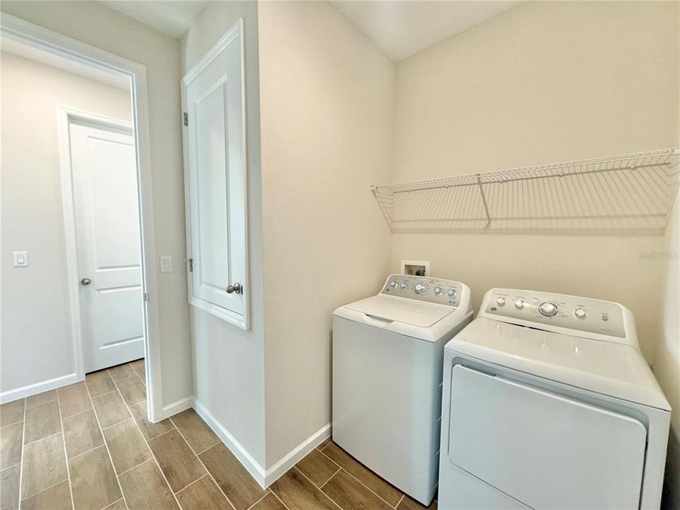 Laundry room equipped with new washer/dryer