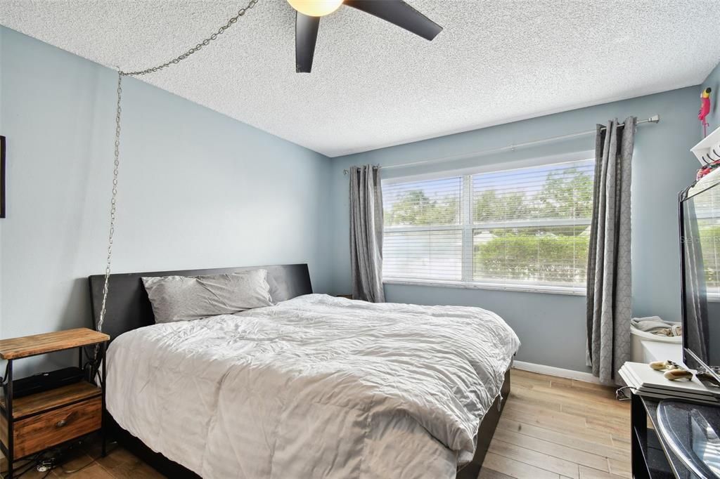 Primary bedroom, a pretty view and natural light