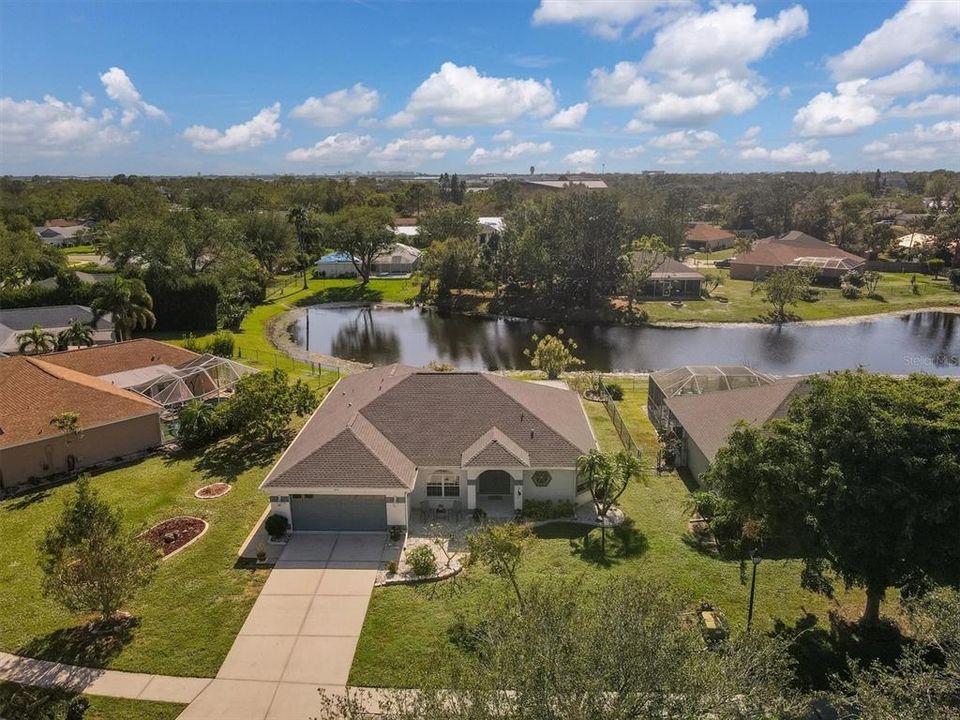 Front of home with Pond views