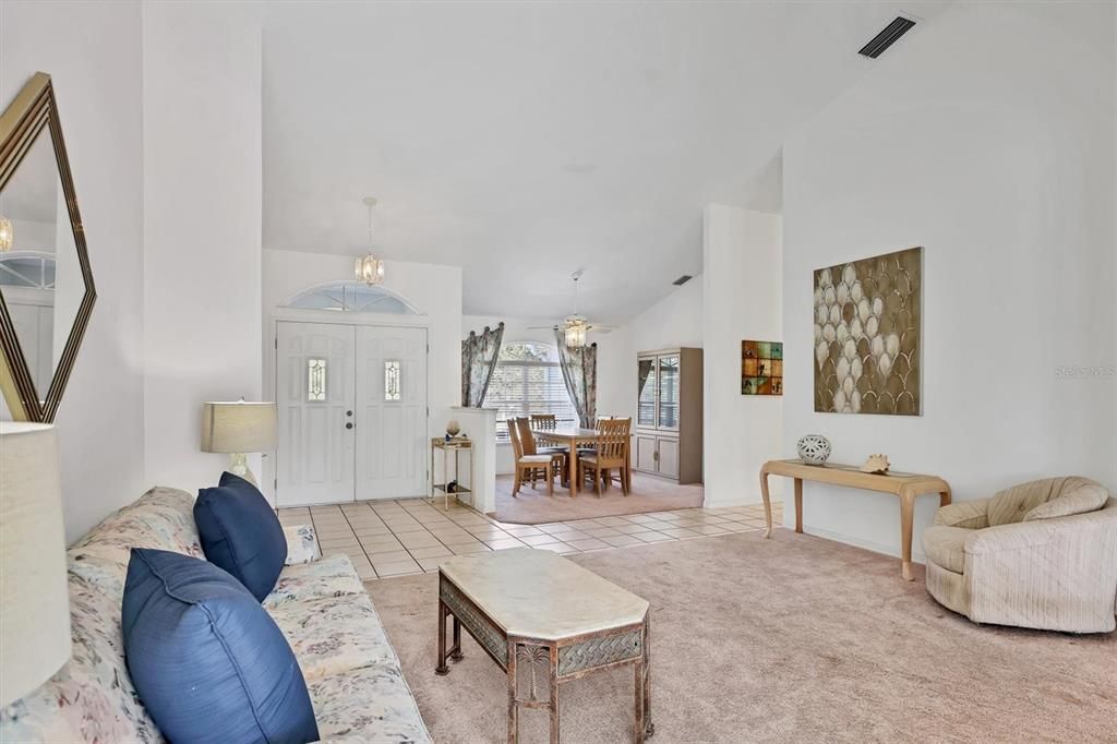 Open Floor Plan Living Room/ Dining Room Cathedral ceilings