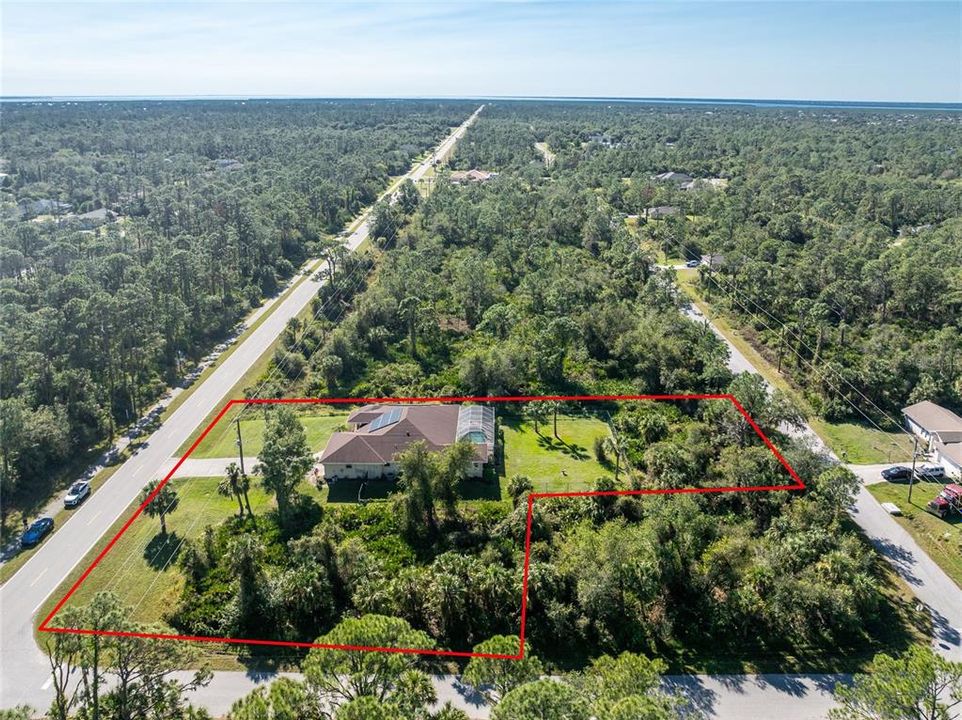 Aerial looking south with Charlotte Harbor on the horizon