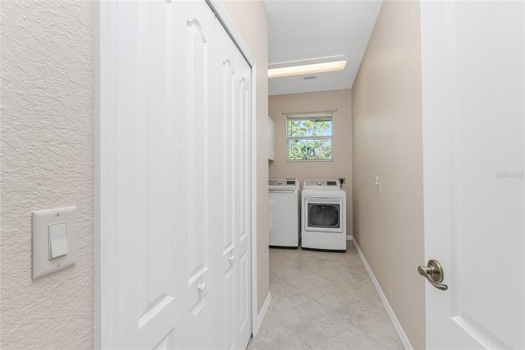 Laundry Room with large storage closet.