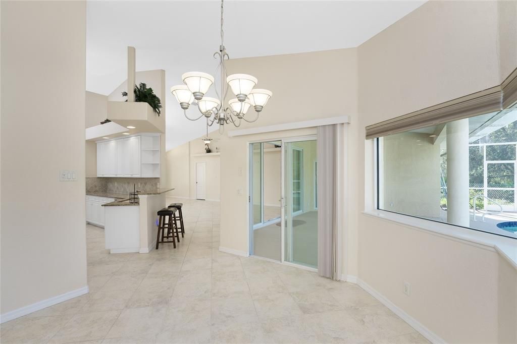 Dinette off Kitchen with Great Room beyond.