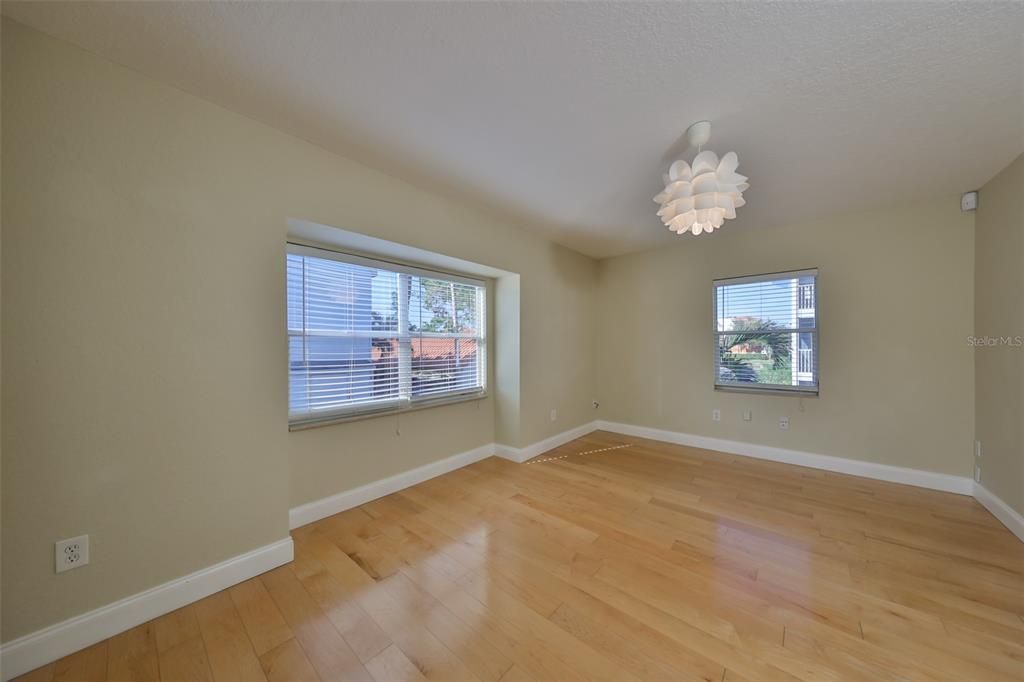 Second Bedroom on main floor with Kitchen/Living Room