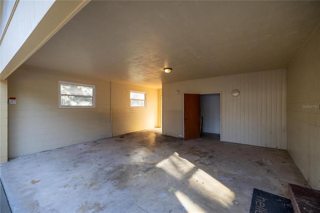 Carport with storage room