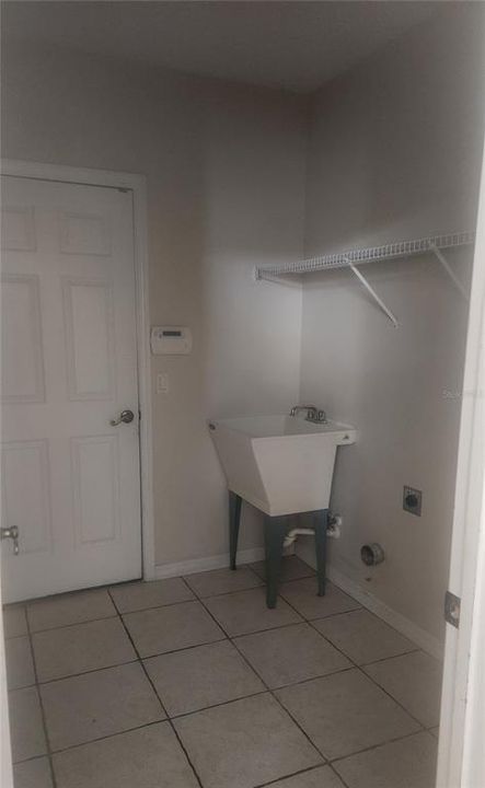 Laundry Room with Utility tub