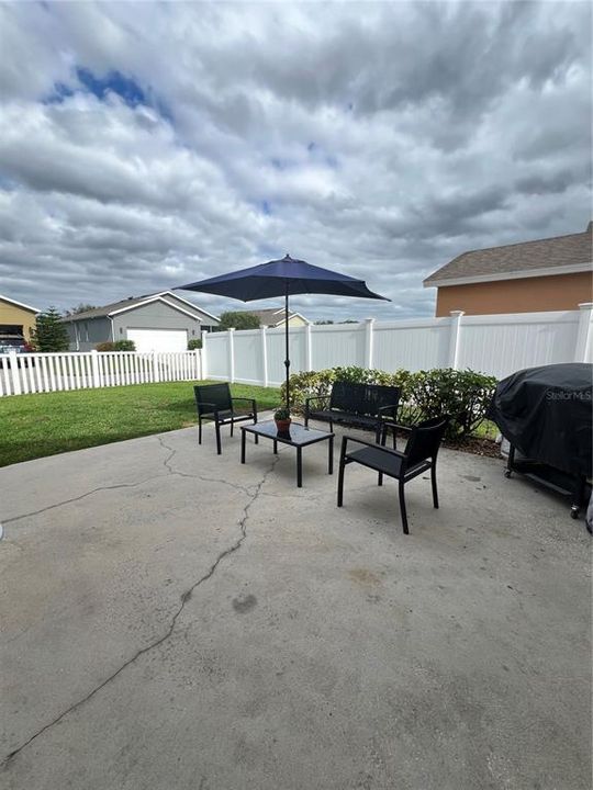 Outdoor living space and grill area.