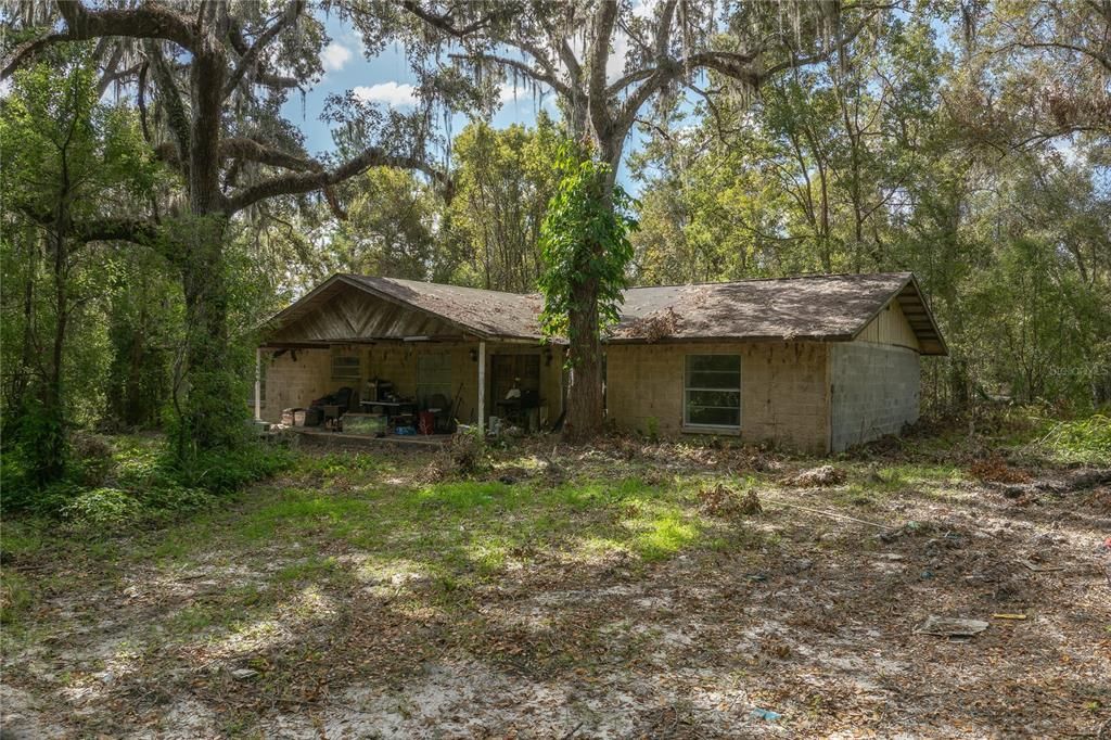 The house which is a tear-down located on the adjacent lot that connect to Endsley Rd.