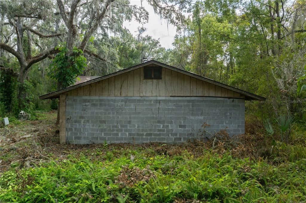 The house which is a tear-down located on the adjacent lot that connect to Endsley Rd.