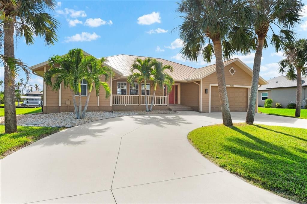 Florida charm with a circular drive for style and convenience