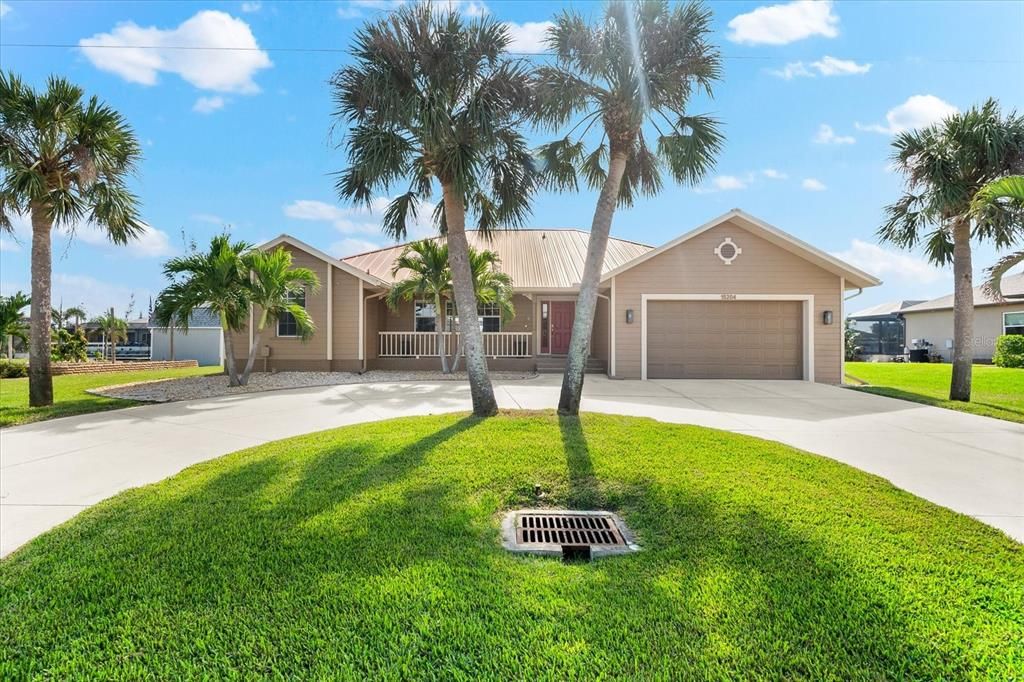 Florida charm with a circular drive for style and convenience