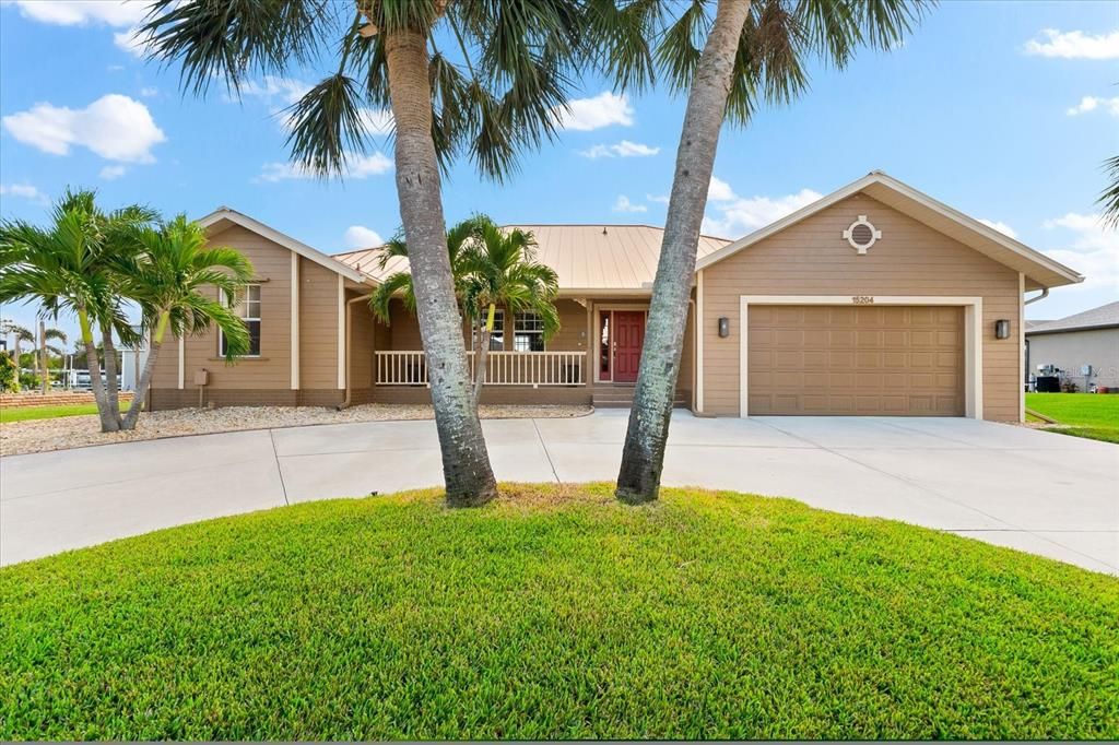 Florida charm with a circular drive for style and convenience