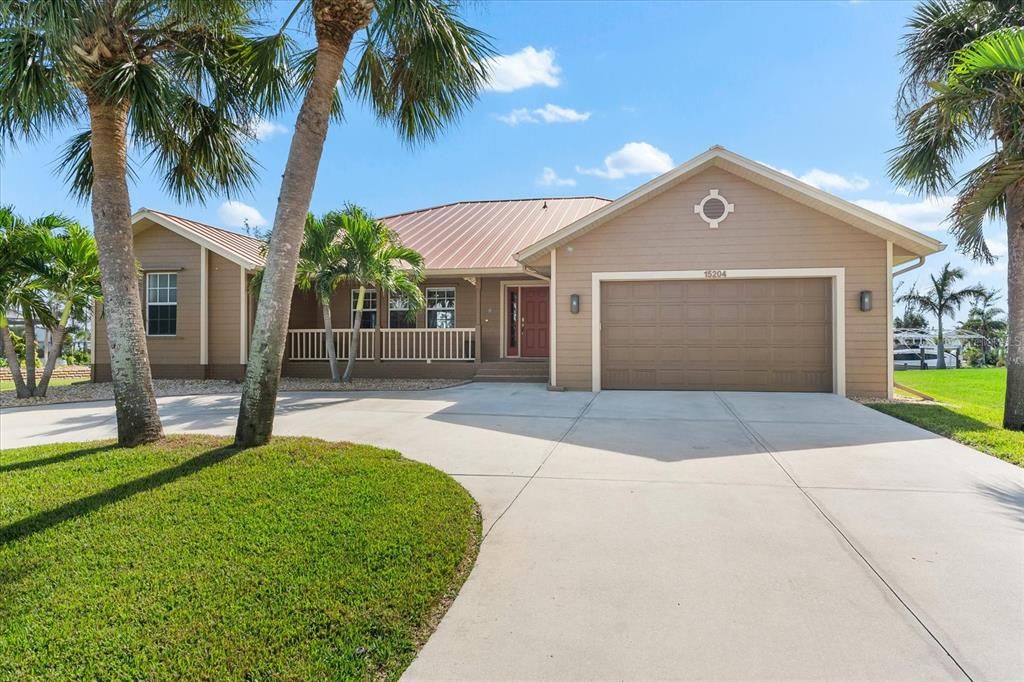 Florida charm with a circular drive for style and convenience