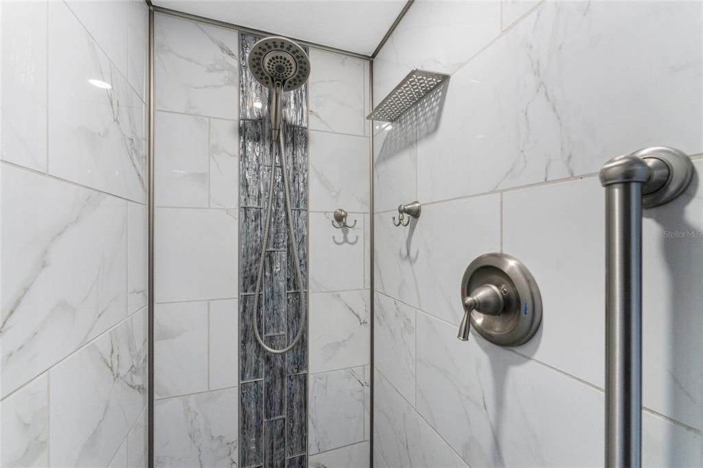 Guest bath has beautiful shower tile!