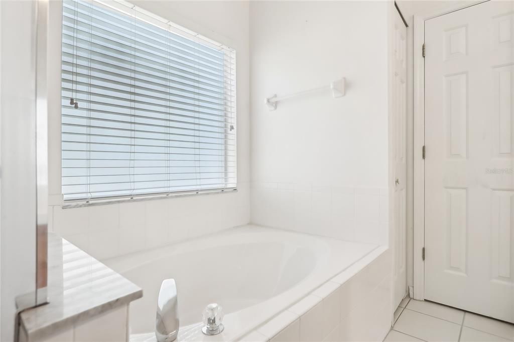 Beautiful soaking tub in the primary bath.