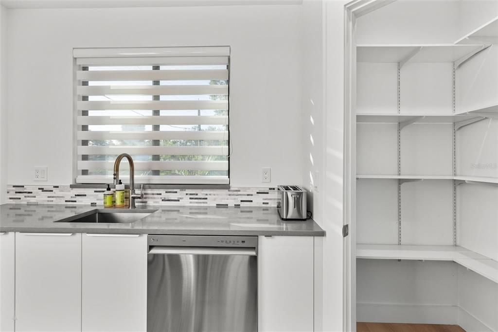 Lots of natural light in the kitchen and a sizeable walk in pantry.