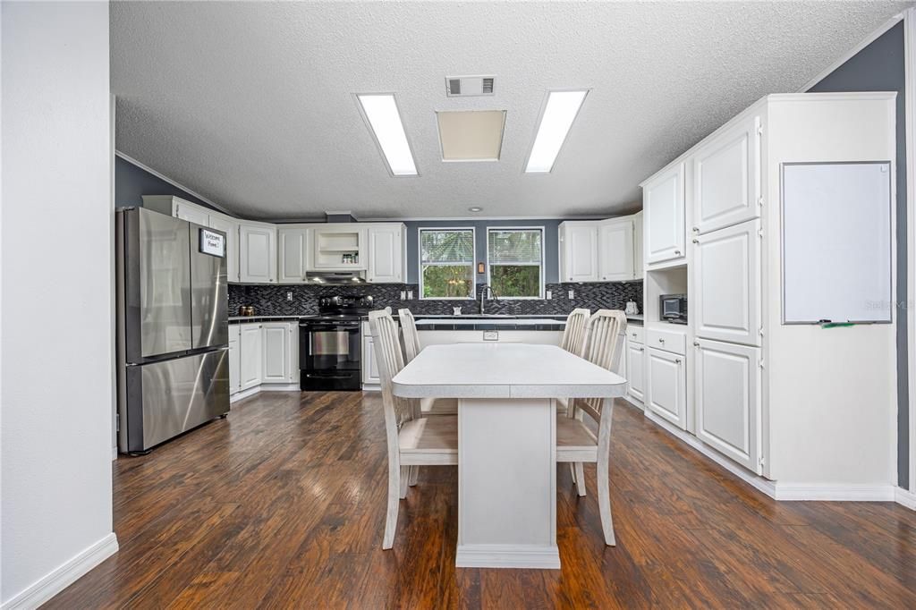 Large kitchen with bar area