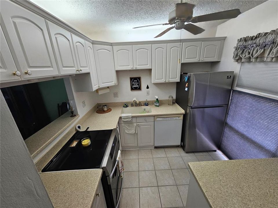 Kitchen from Entry Hall Updated appliances and Solid Surface Counters