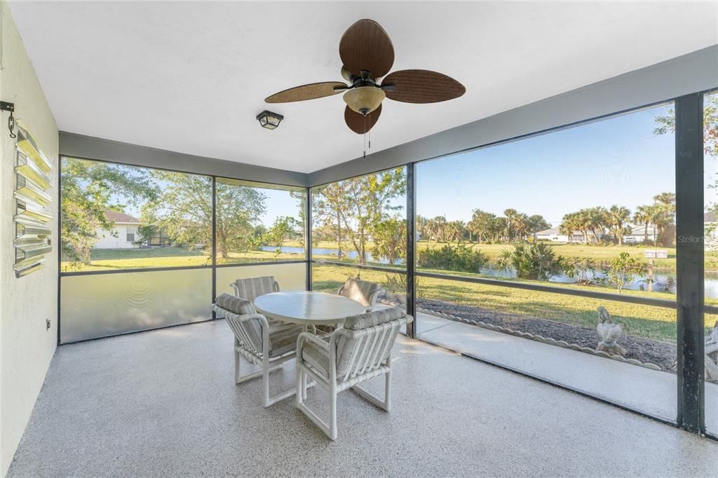 The lanai has a ceiling fan, view of the canal and plenty of room to entertain.