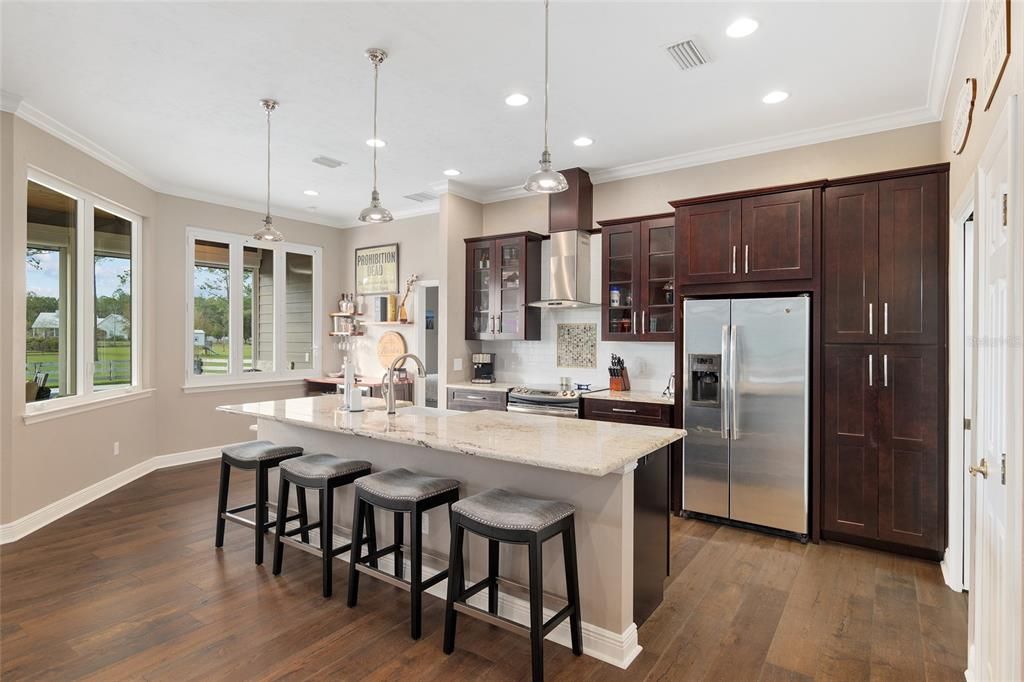 STUNNING KITCHEN WITH ISLAND FOR ADDED SEATING