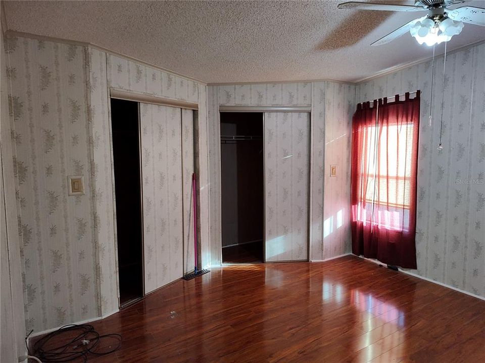 Master bedroom with additional closets