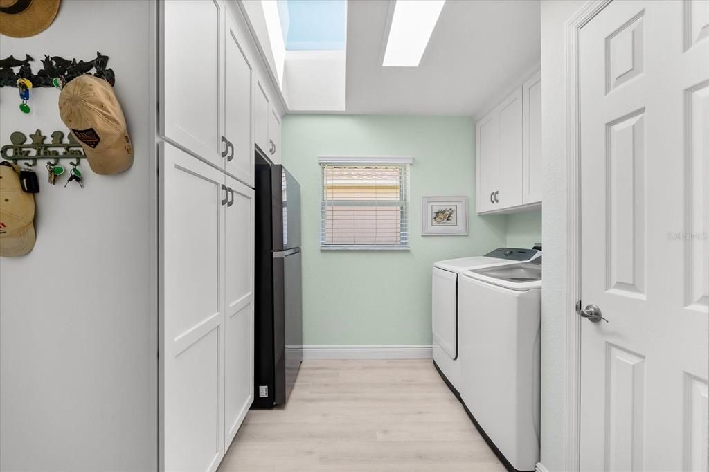 Laundry Room with storage closets