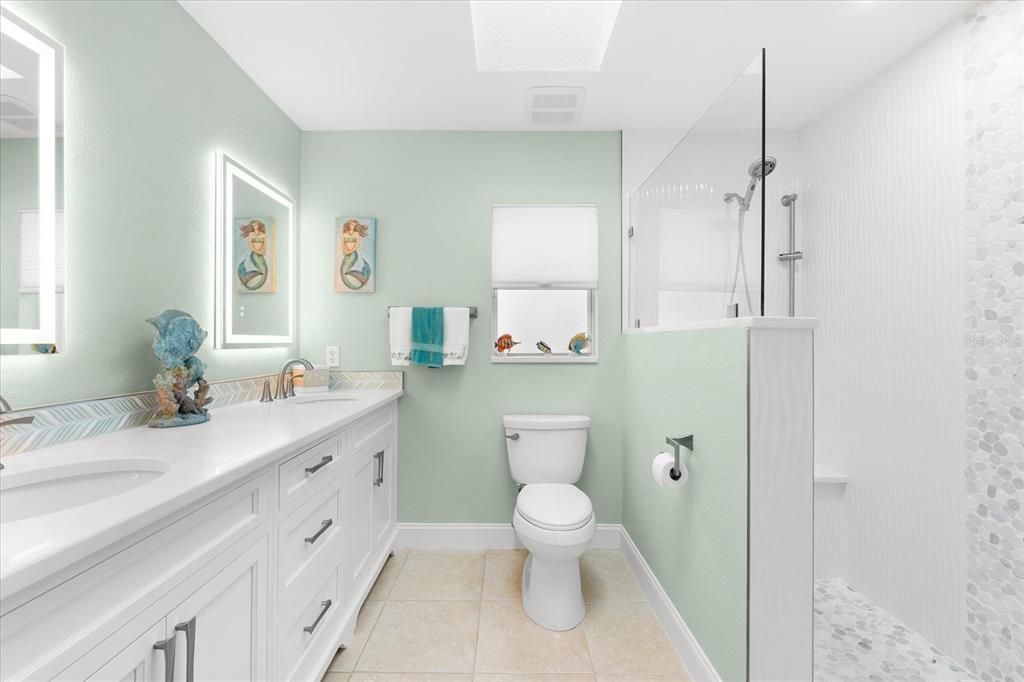 Guest bath - walk in shower and double vanity.