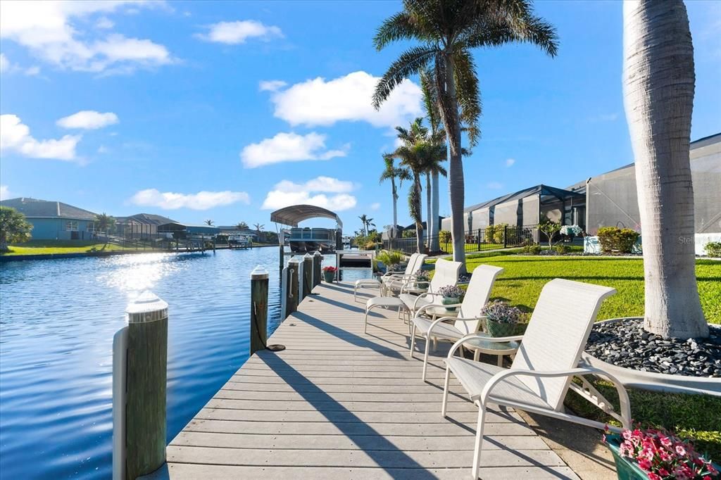 Large composite dock with dock box, fish cleaning station and DokLite solar lighting.