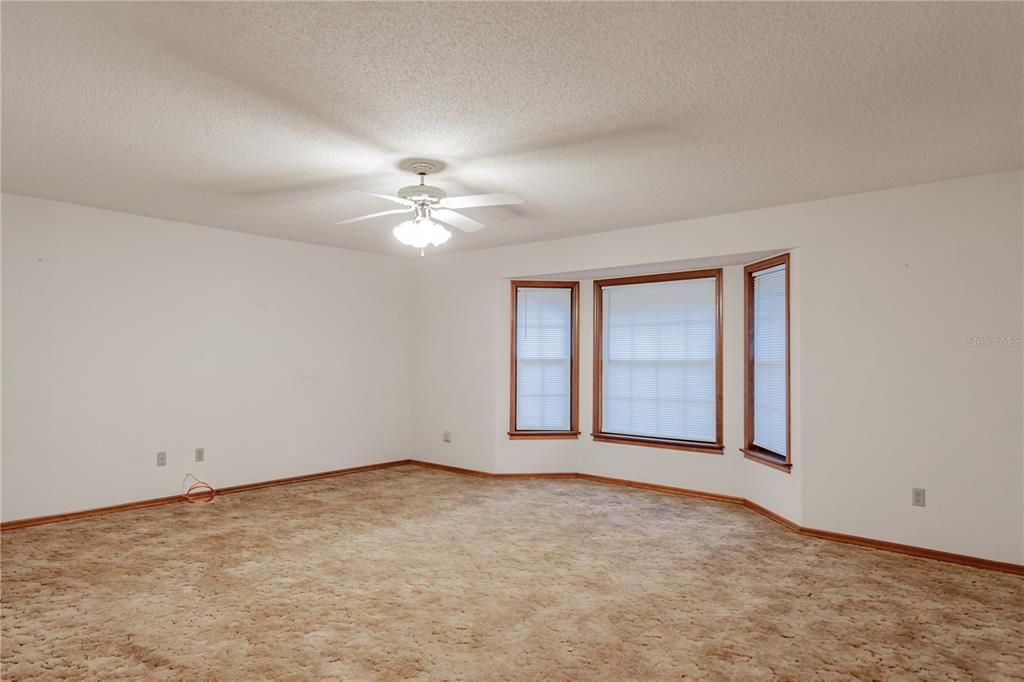 Living room with bay windows