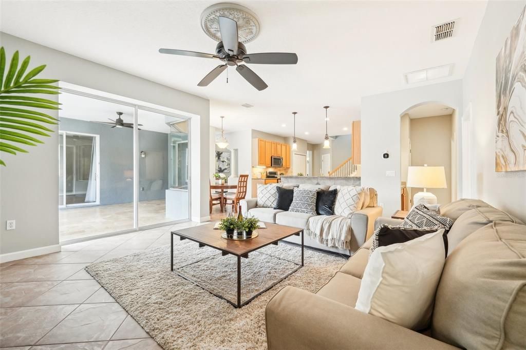 Spacious family room with oversized sliders to the lanai